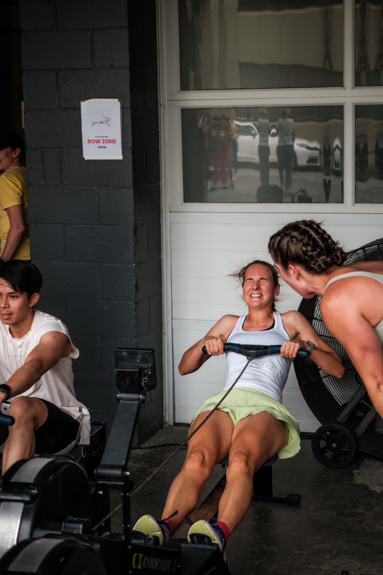 CrossFit BC members celebrating together at the HYROX finish line in Vancouver.