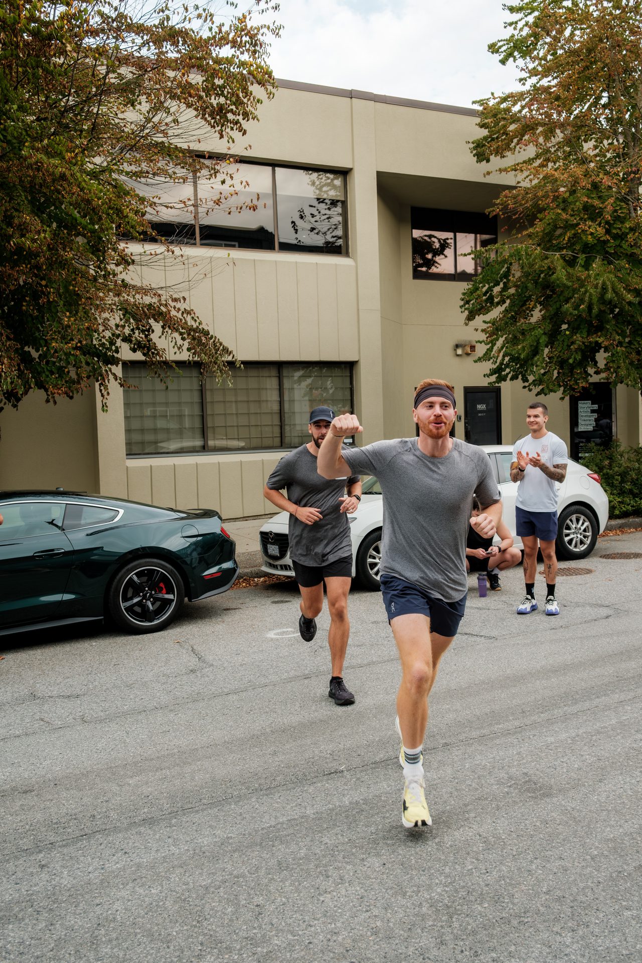 Athletes pushing through the final stations