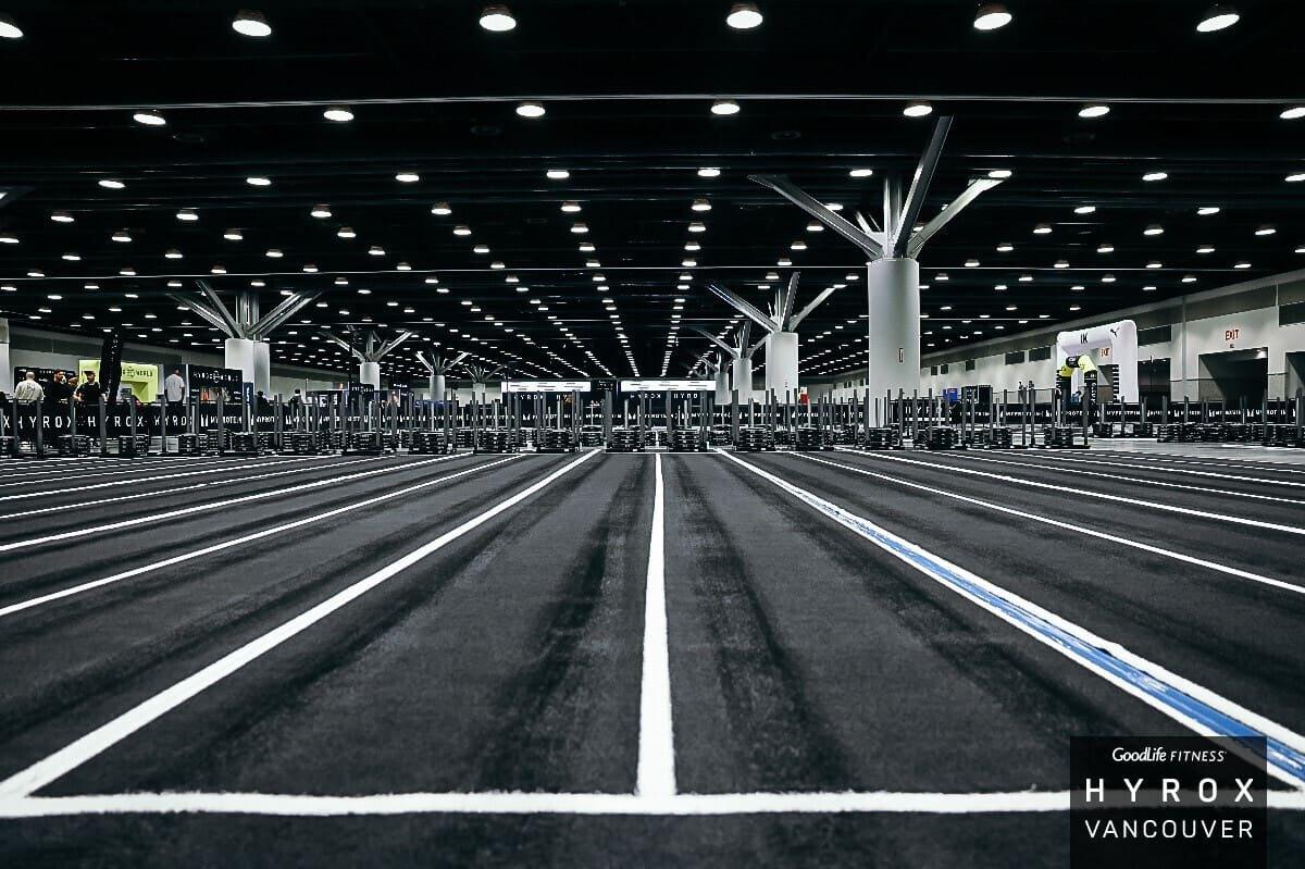 The marked HYROX Vancouver run track stretching down the length of the venue floor